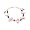 Handmade bracelet with irregular pearls and purple gemstone beads on gold chain