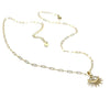 Gold plated necklace with sunburst eye pendant and delicate chain on white background